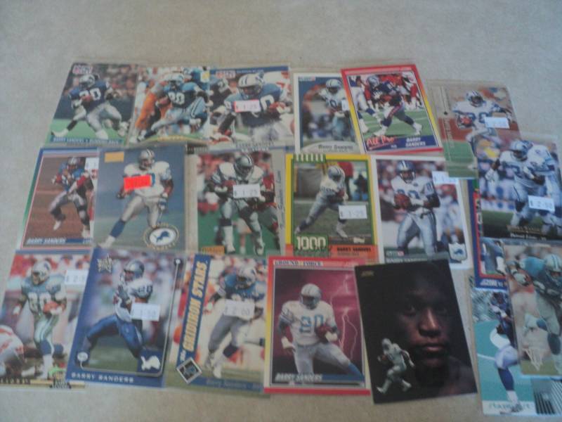 lot 65 image: 20 Barry Sanders Cards...
