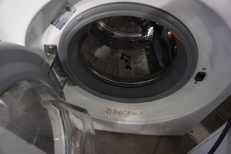 lot 66 image: Whirlpool Model WM3477HW Front Load Washing Machine