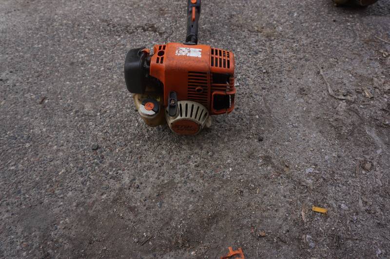 lot 28 image: Stihl Model FS110 Gas Powered Weed Trimmer