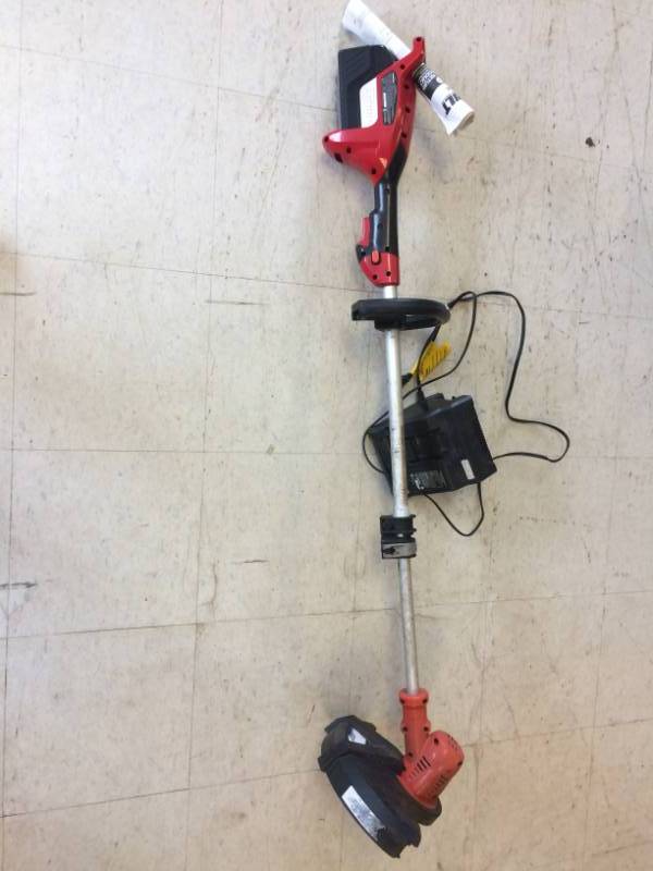 lot 24 image: Battery Operated Lawn Trimmer