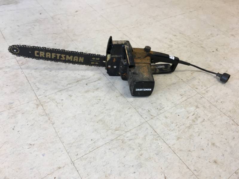 lot 49 image: Electric Chainsaw