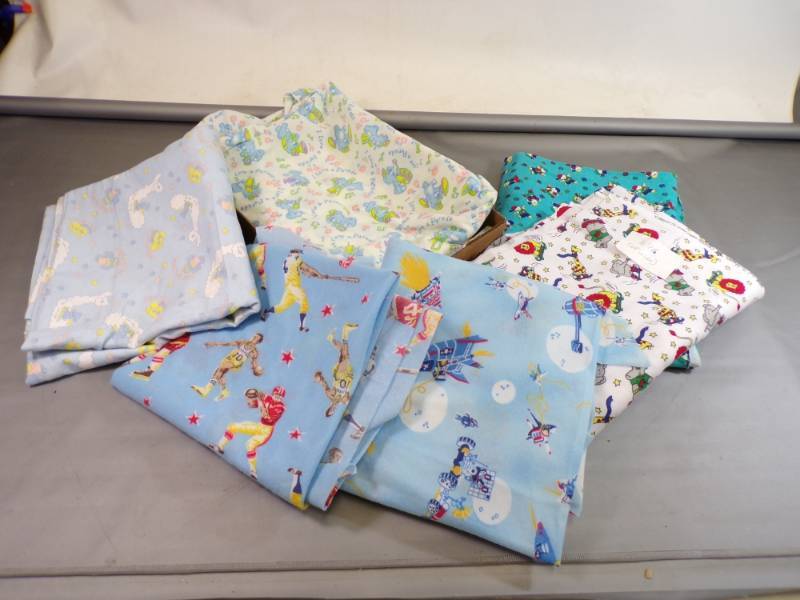 lot 68 image: Flat of Child Print Fabric 10 Yards