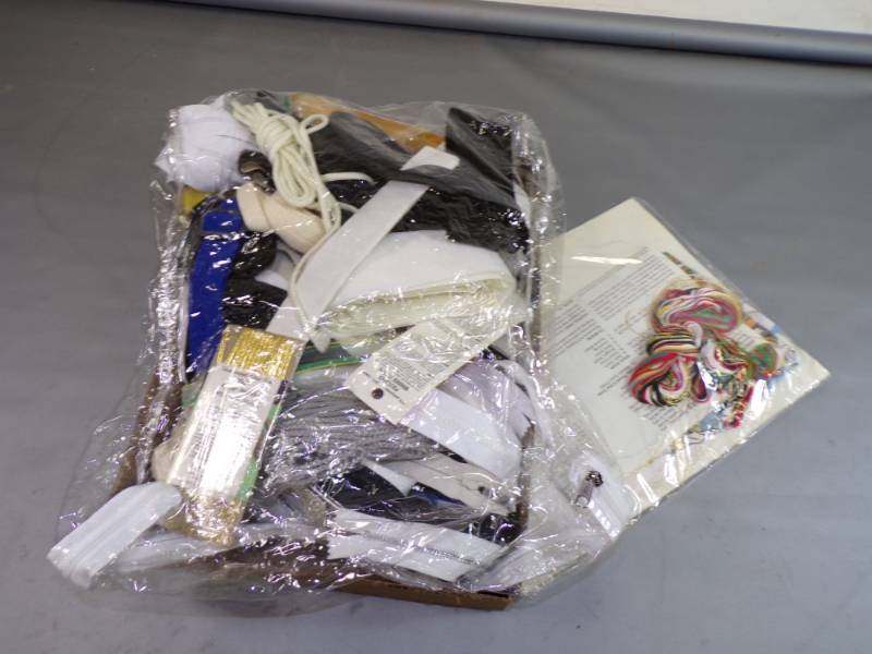 lot 84 image: Flat of notions, elastic, zippers, hook and loop etc and creative circle kit