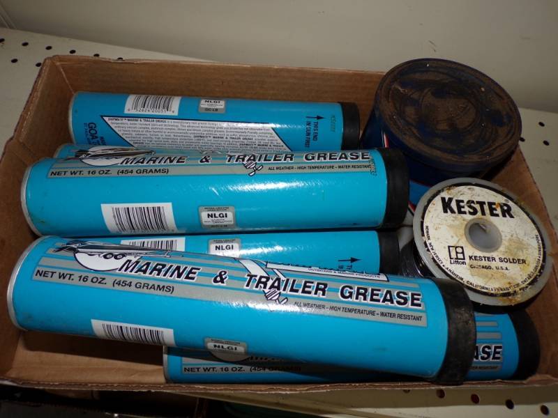 lot 104 image: Flat of Marine and trailer grease, rolls of solder