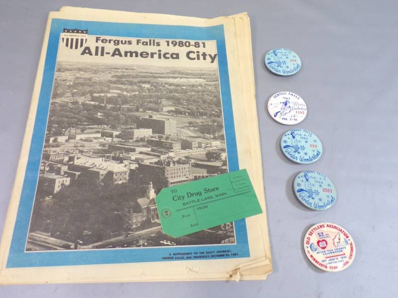 lot 108 image: Fergus Falls and Battle Lake Pins and newspapers