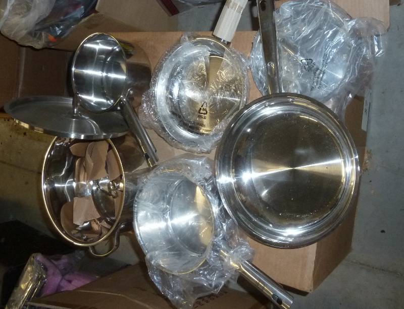 lot 68 image: New set of pots and pans, one large...