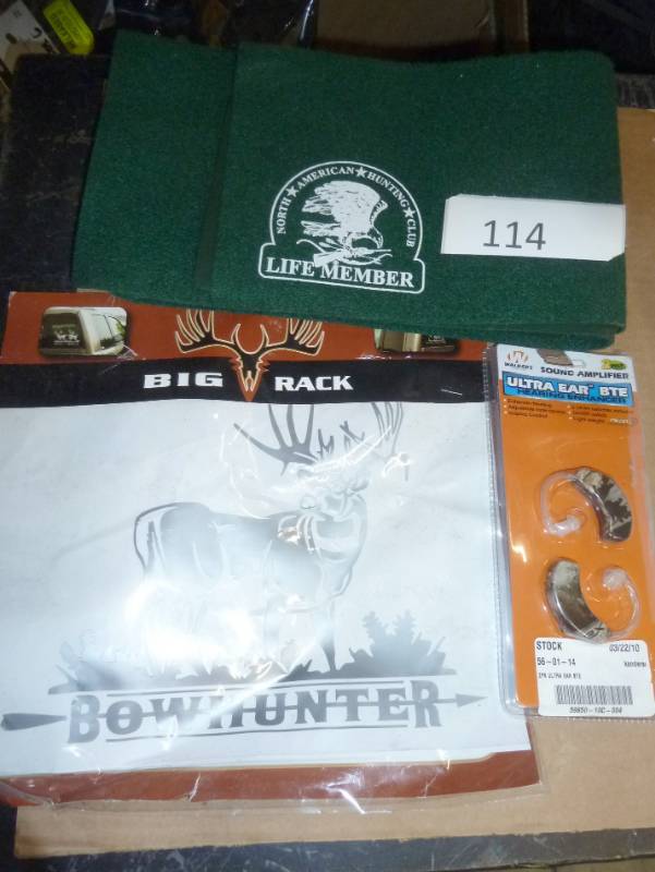 lot 114 image: rifle cleaning pad, deer sticker an...