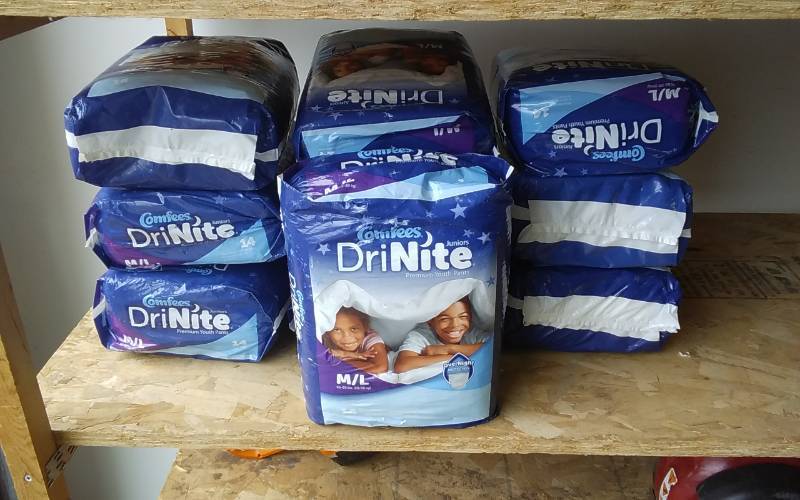lot 15 image: 10 Packages Comfees Jr. Dri-Nite Youth Pants Size ML (65-85 Lbs.)
