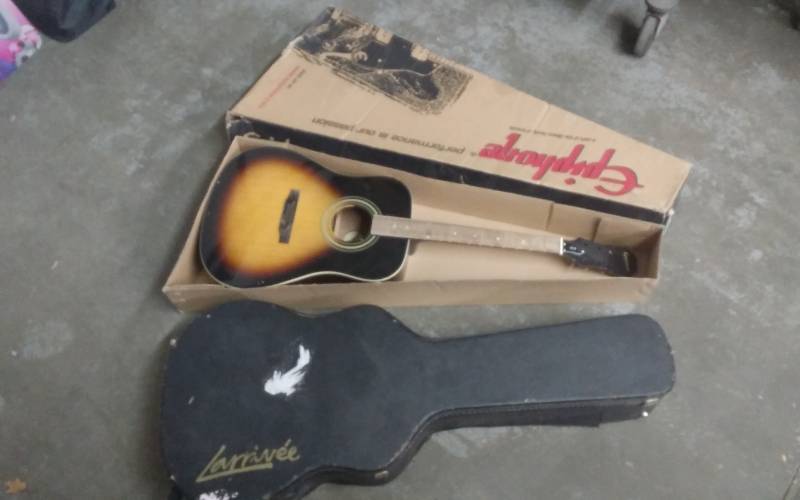 lot 47 image: Epiphone Guitar Model PR-150 VS With Original Box. Has No Strings Or Tightening Keys. Also Another Case