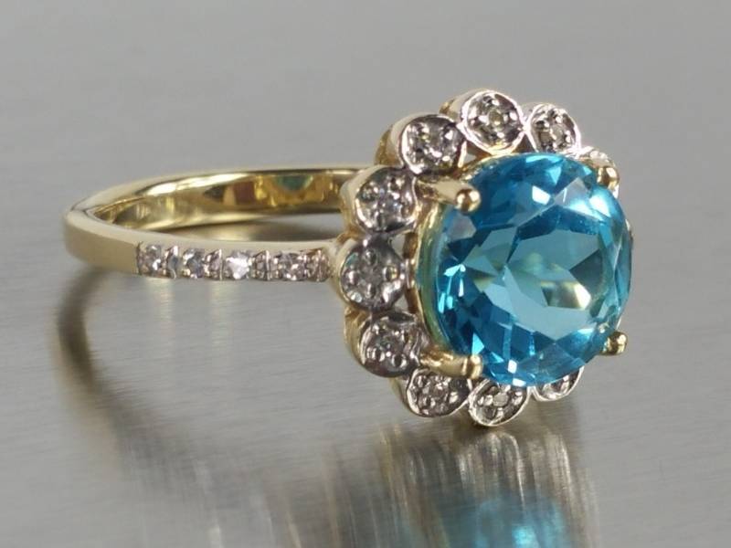 lot 10 image: Natural Swiss Topaz and Diamond Ring in 14k Yellow Gold
