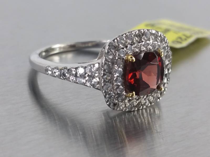 lot 26 image: Gorgeous Garnet and White Zircon Halo Sterling Silver Estate Ring