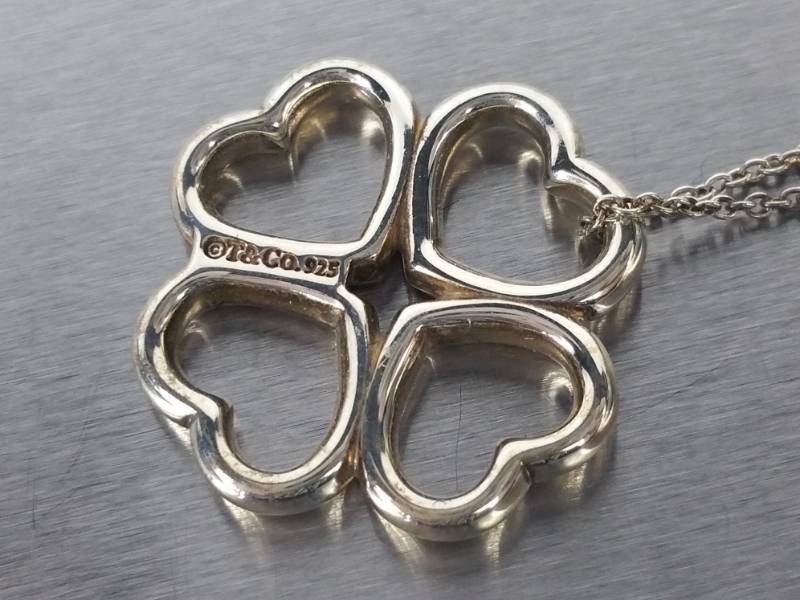 lot 29 image: Tiffany & Co Four Leaf Clover Heart Sterling Silver Estate Necklace