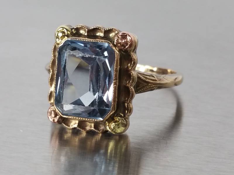 lot 33 image: Grayish Blue Gemstone Set in a Multi-Colored 10k Gold Vintage Estate Ring