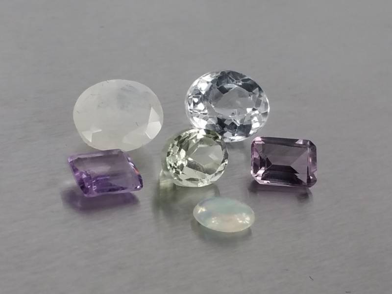 lot 48 image: Group of Natural Loose Stones Opal, Amethyst, Etc.