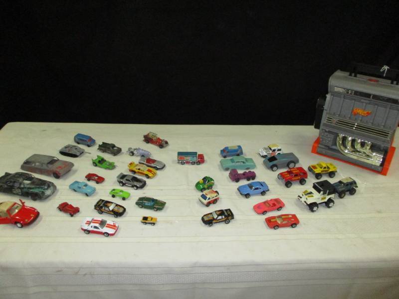 Toy cars and trucks and Hotwheels Case