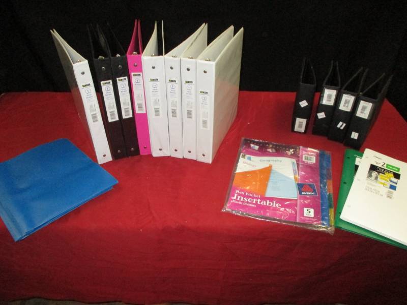 eight 1 binders and folders and little binders