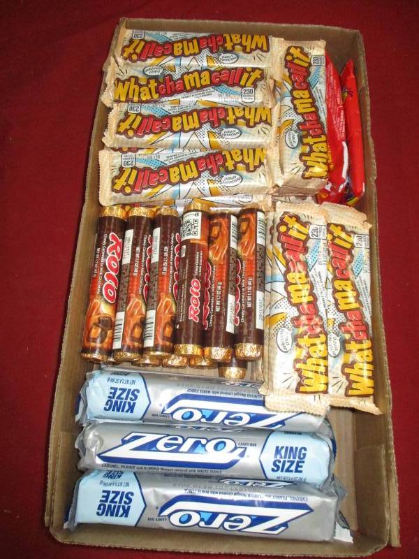48 Whatchamacallit, Rolo, Zero, and Nut Roll bars