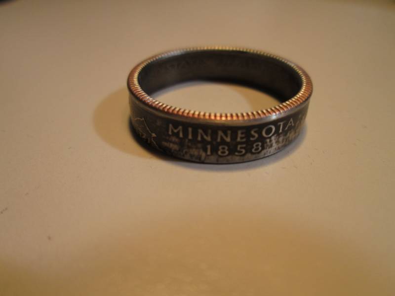lot 57 image: Minnesota Band Ring Looks to be mad...