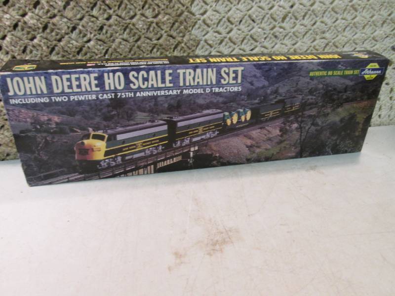 lot 93 image: John Deere Ho Scale Train Set in Bo...