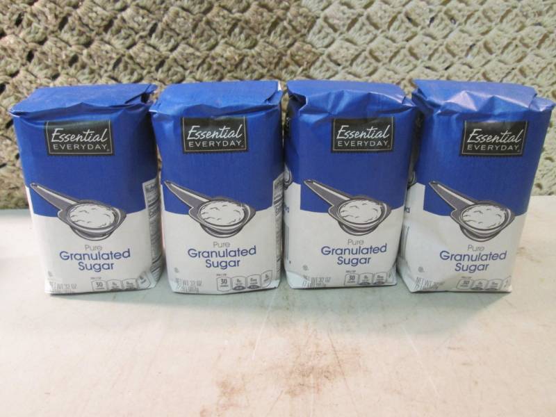 lot 136 image: 4 2 Pound Bags of Pure Granulated S...