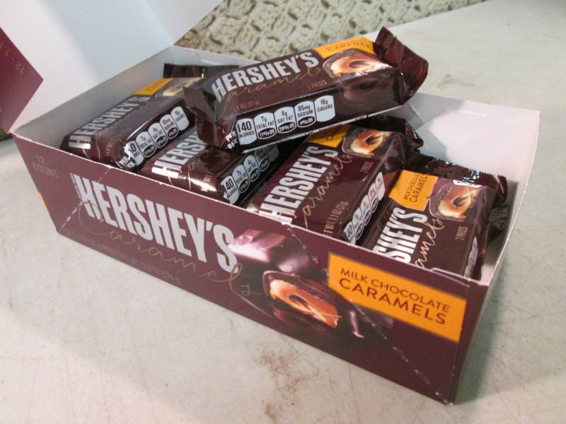 lot 143 image: Box of 12 Hersheys Caramels Best by...