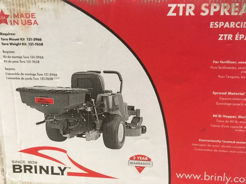 lot 10 image: Brinly-Hardy Rear Mounted ZTR Spreader not used