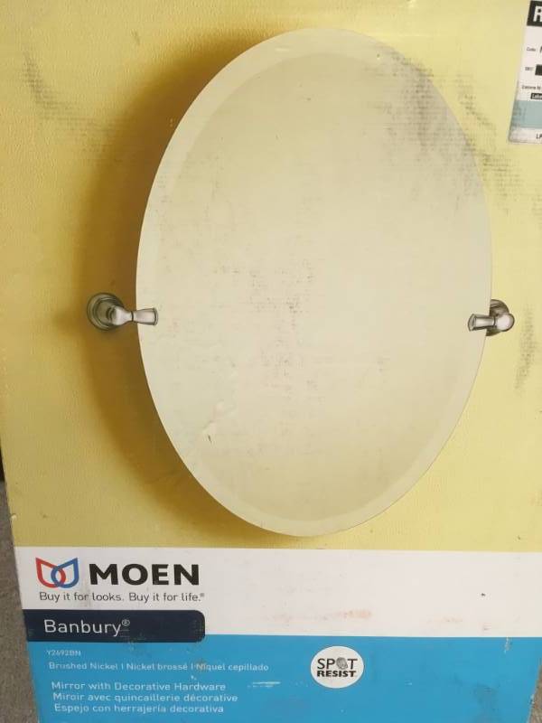 lot 28 image: MOEN Banbury 26 in. x 23 in. Frameless Pivoting Wall Mirror in Brushed Nickel in good condition