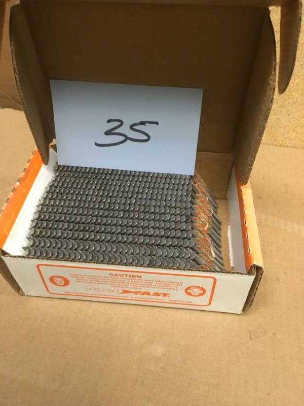 lot 35 image: Pneu-Fast 2-38 in. x 0.113 in. Ring Hot Galvanized 30-34 Degree Paper Tape Clipped Head Framing Nails in good condition