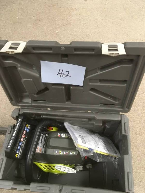 lot 42 image: RYOBI 16 in. 37cc 2-Cycle Gas Chainsaw with Heavy-Duty Case in good condition