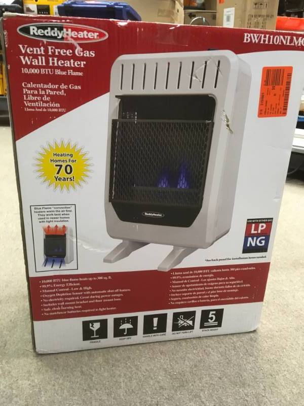 lot 49 image: Reddy Heater 10,000 BTU Blue Flame Dual-Fuel Wall Heater in good condition