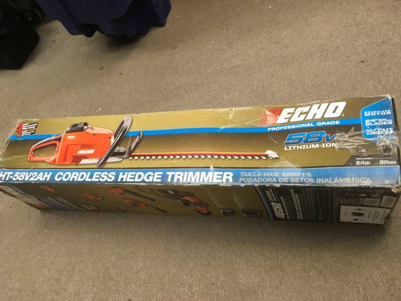 lot 102 image: ECHO 24 in. 58-Volt Lithium-Ion Brushless Cordless Hedge Trimmer - 2.0 Ah Battery and Charger Included in good condition