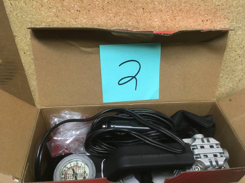 lot 2 image: Husky 12-Volt Inflator in good condition