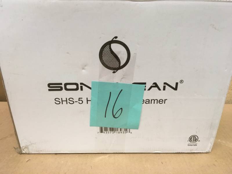lot 16 image: Soniclean Handheld Steamer with Attachments in good condition