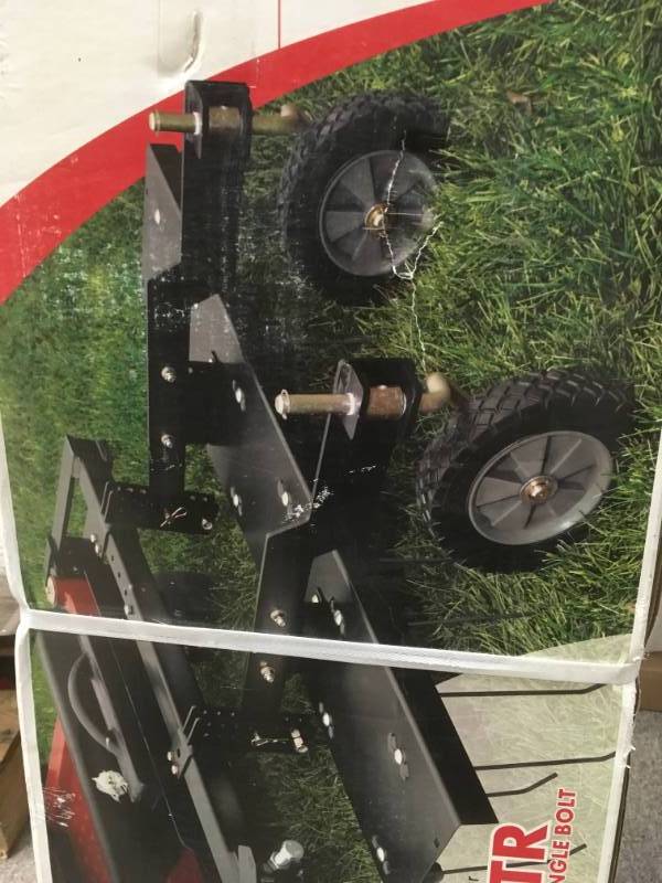 lot 19 image: Brinly-Hardy 48 in. Front Mount Dethatcher for ZTR Mowers not used