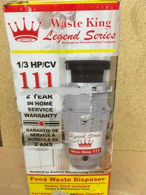 lot 23 image: Waste King Legend Series 13 HP Continuous Feed Garbage Disposal in good condition