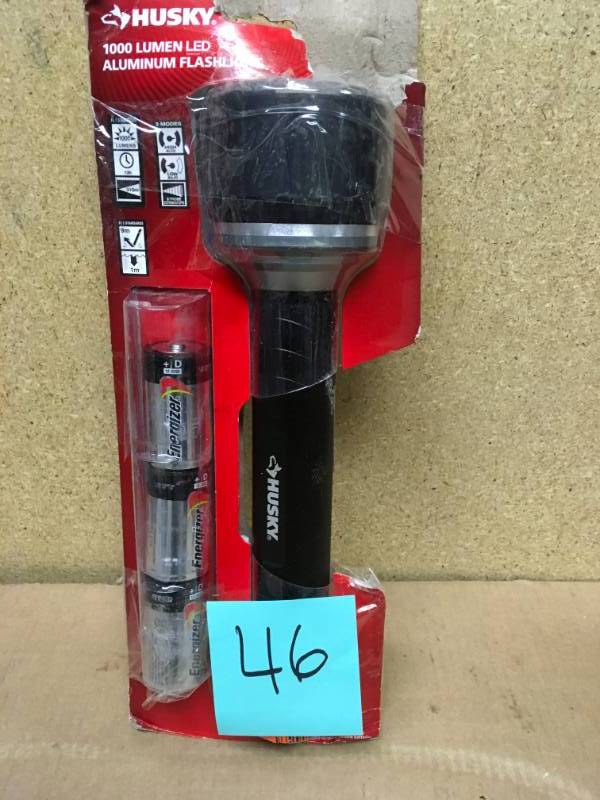 lot 46 image: Husky 1000 Lumen Virtually Unbreakable Aluminum Flashlight in good condition