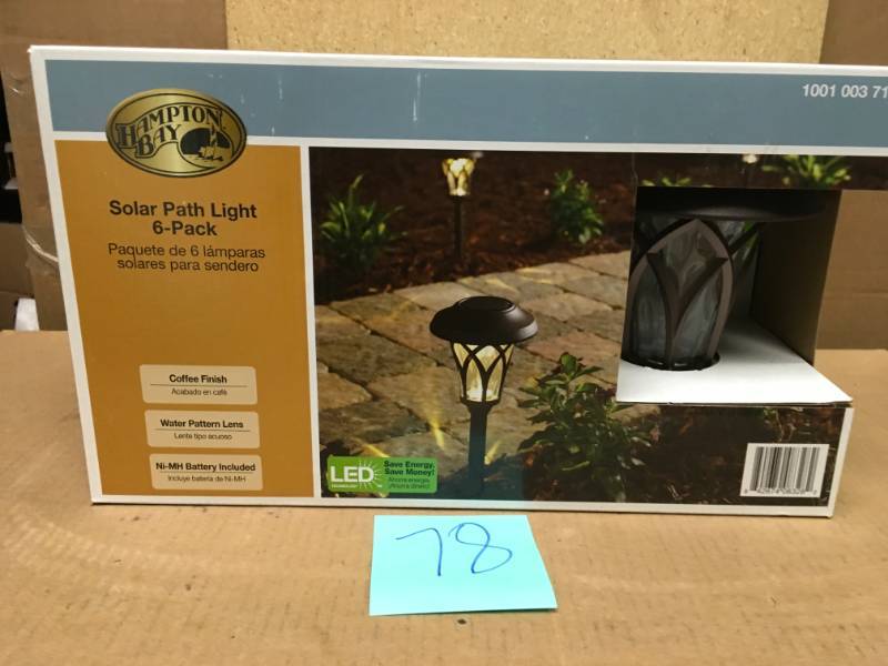 lot 78 image: Hampton Bay Solar Bronze Outdoor Integrated LED Landscape Fan Cage Path Light with Water Glass Lens (6-Pack) not used