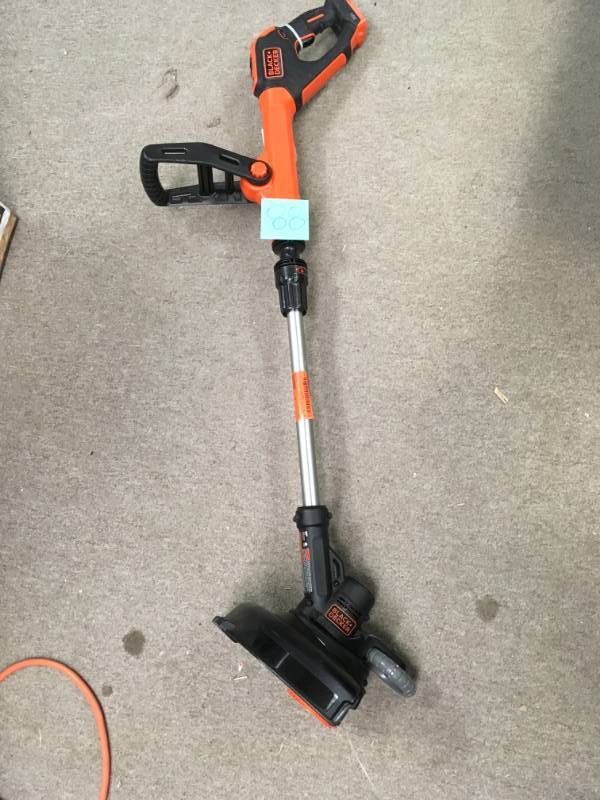 lot 88 image: BLACKDECKER 12 in. 20-Volt MAX Lithium-Ion Cordless 2-in-1 String Grass TrimmerLawn Edger with 2.5Ah Battery and Charger Included in good condition