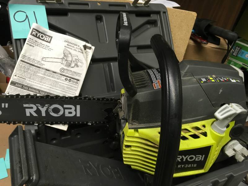 lot 91 image: RYOBI 18 in. 38cc 2-Cycle Gas Chainsaw with Heavy Duty Case in good condition