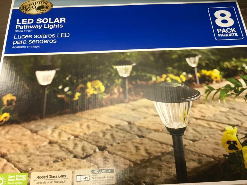 lot 25 image: Hampton Bay Solar Black Outdoor Integrated LED Landscape Path Light with Ribbed Pattern Glass Lens (8-Pack) not used
