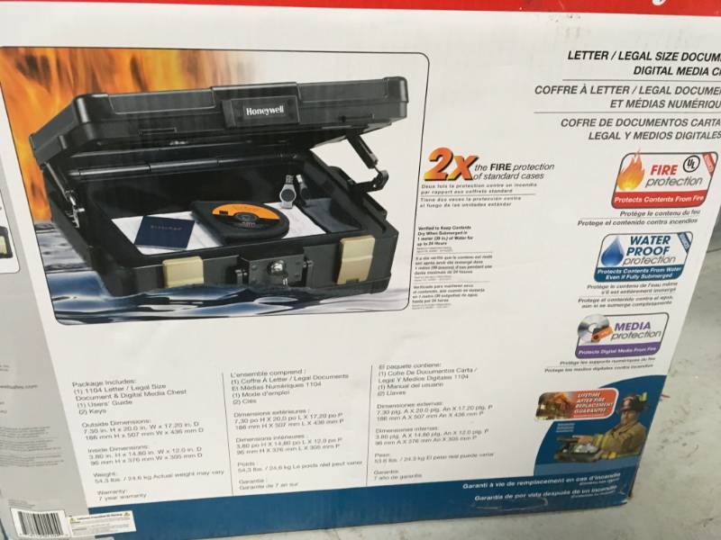 lot 99 image: Honeywell 0.39 cu. ft. Molded Fire Resistant and Waterproof Legal Document Storage Chest with Key and Double Latch Lock in good condition