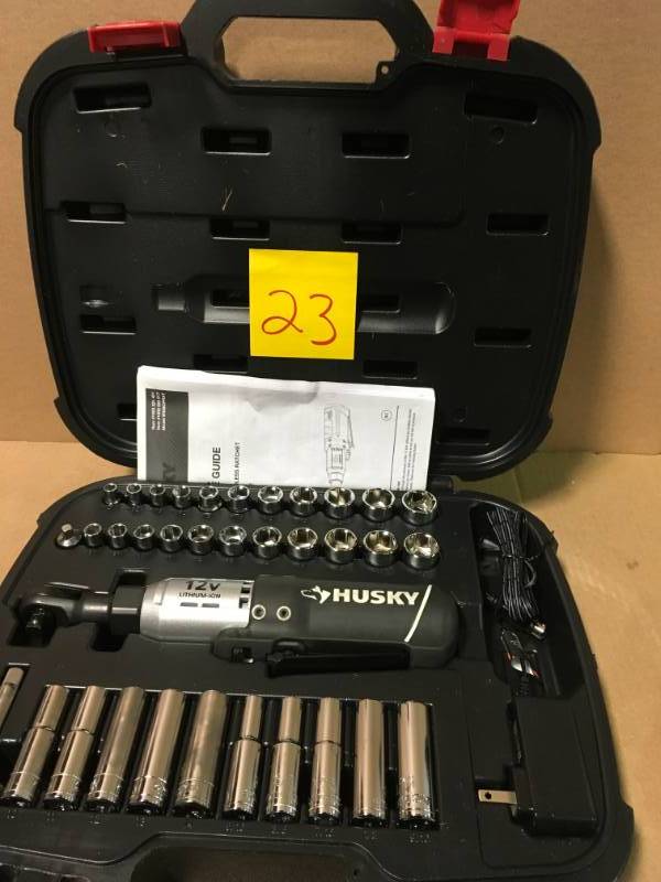 lot 23 image: Husky Cordless Ratchet Impact Wrench 38 in. Drive 12Volt Lithium in very good condition