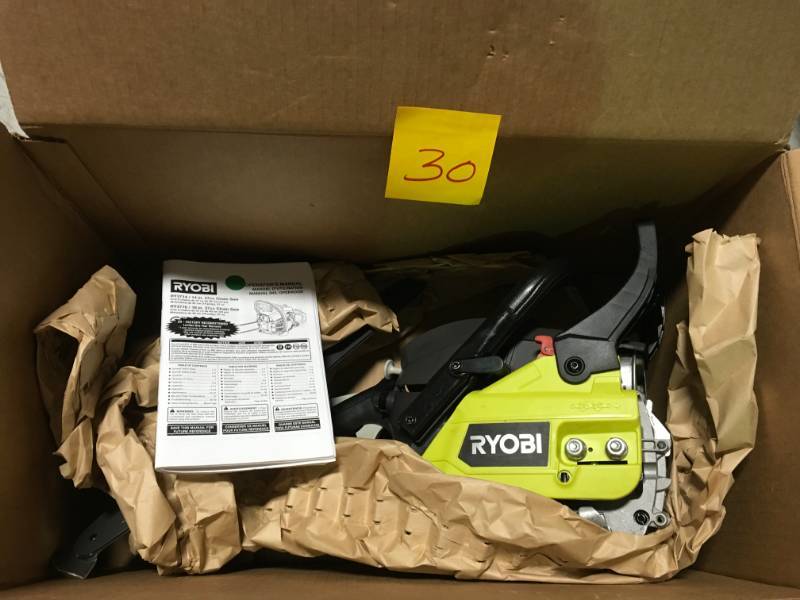 lot 30 image: RYOBI Reconditioned 14 in. 37cc 2-Cycle Gas Chainsaw in very good condition