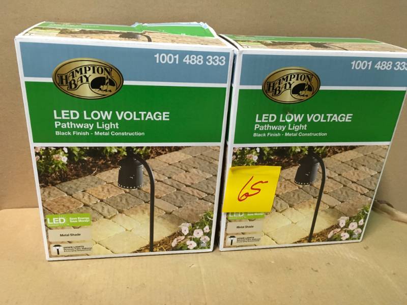 lot 65 image: Hampton Bay Low-Voltage Black Outdoor Integrated LED Landscape Path Light with Shade Details QTY 2 not used