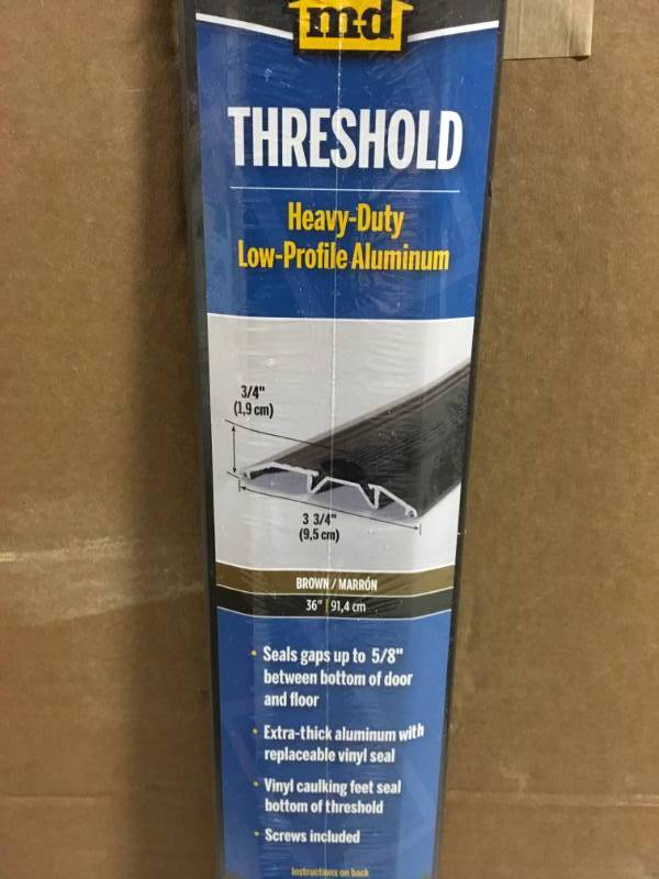 lot 77 image: M-D Building Products 3-34 in. x 36 in. Bronze Aluminum Deluxe Low-Rug Threshold not used
