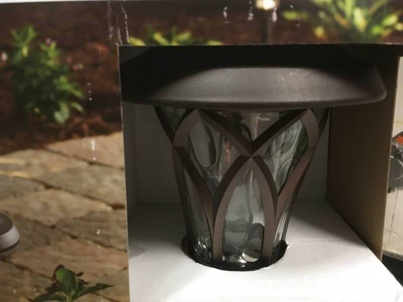 lot 87 image: Hampton Bay Solar Bronze Outdoor Integrated LED Landscape Fan Cage Path Light with Water Glass Lens (6-Pack) not used