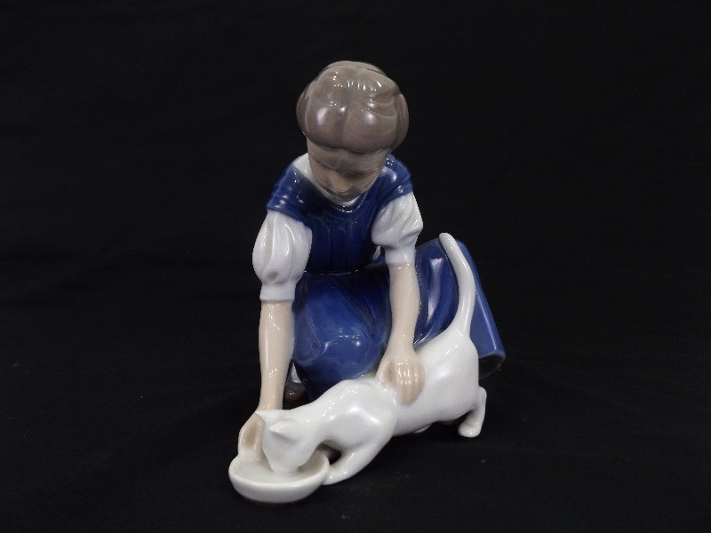 lot 11 image: Porcelain Royal Copenhagen B & G Bing and Grondahl&nbspGirl Feeding Cat #1745
