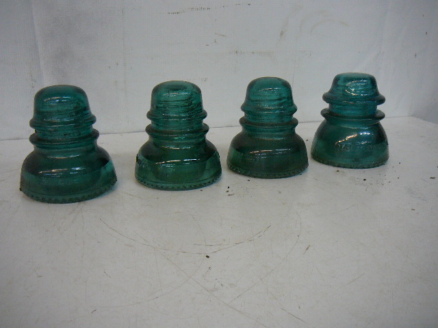 lot 56 image: Vintage Hemingray Hi-Line Insulators