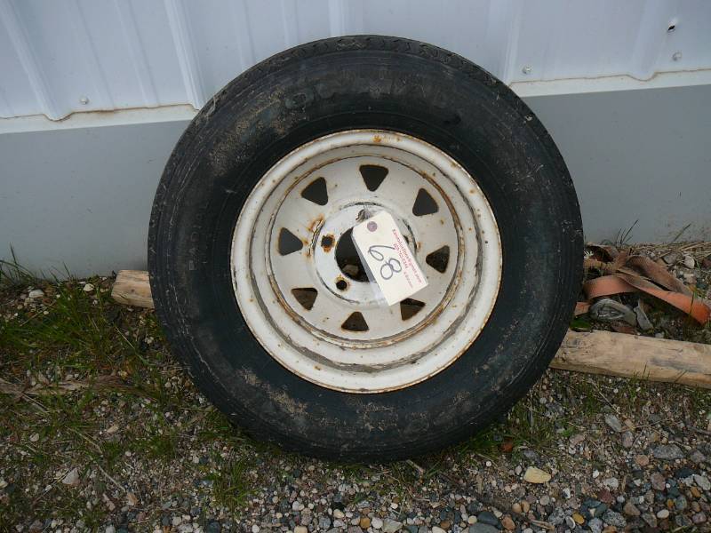 lot 68 image: Skid Loader Rim and Tire
