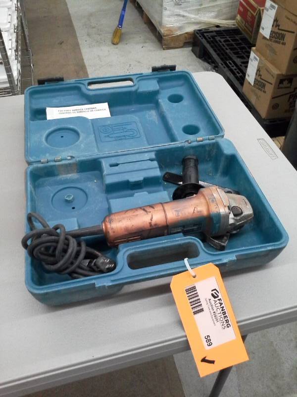 lot 589 image: Makita 4in. Angle Grinder with Case